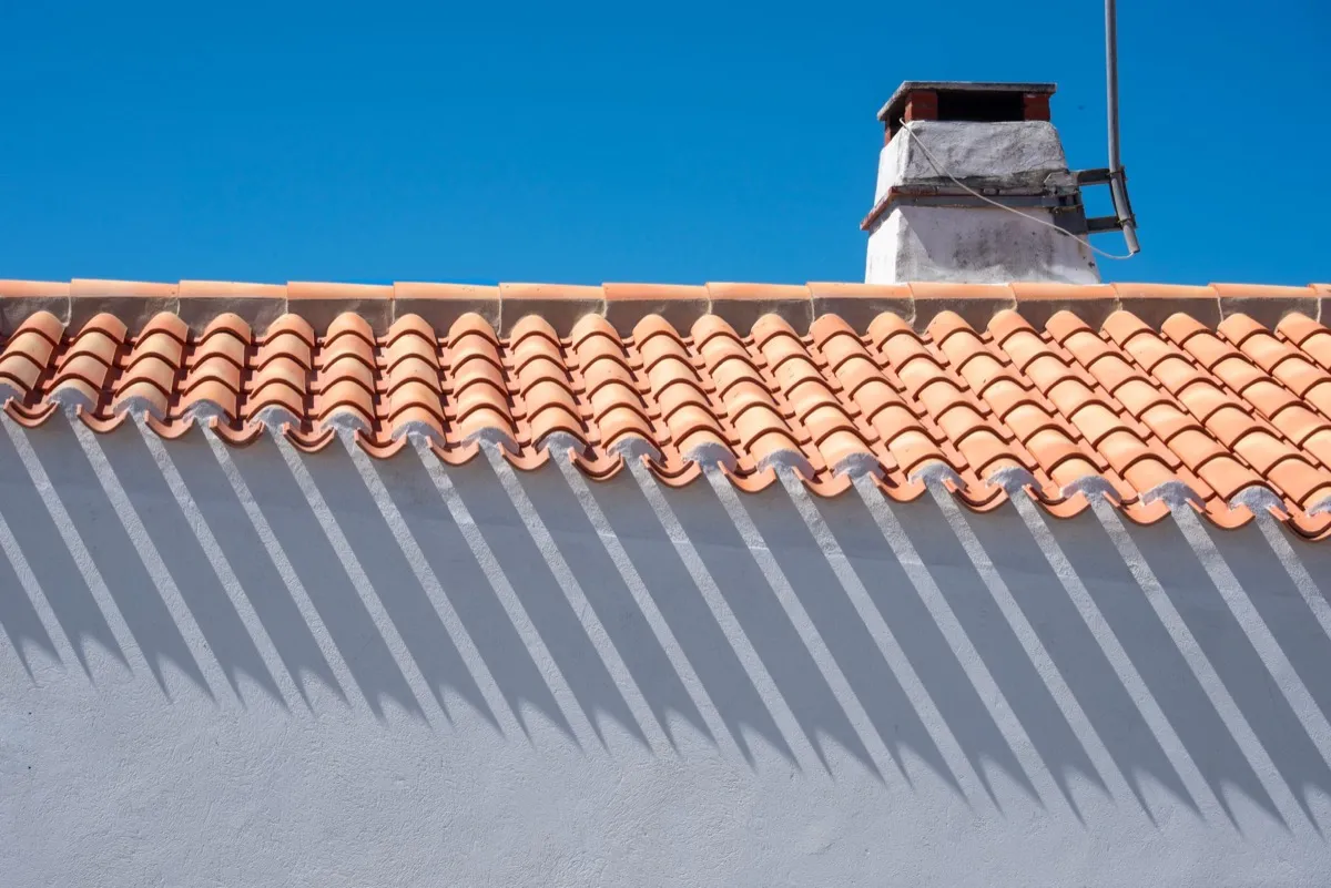 Roof ridge line and chimney on a home in Fort Collins, CO