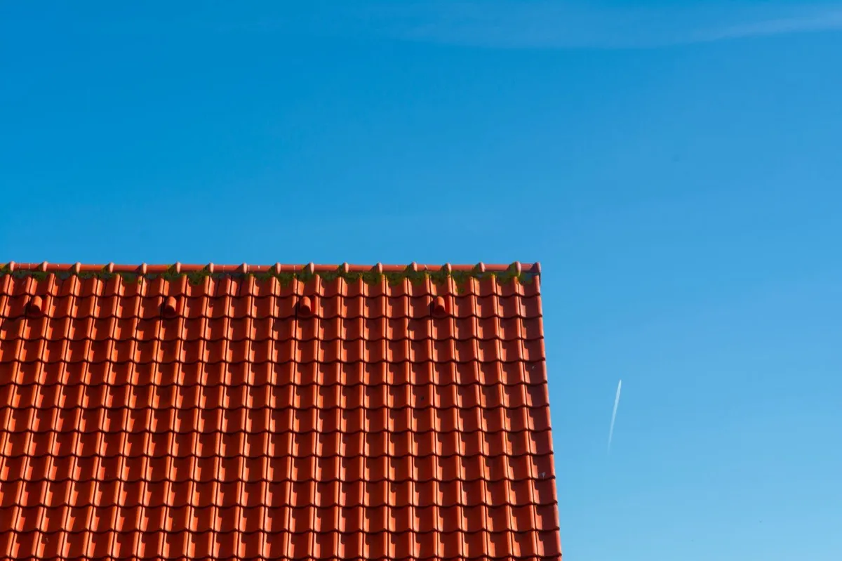 Tile roof gable in full sun, the kind of exposure that sets roof life in Fort Collins, CO